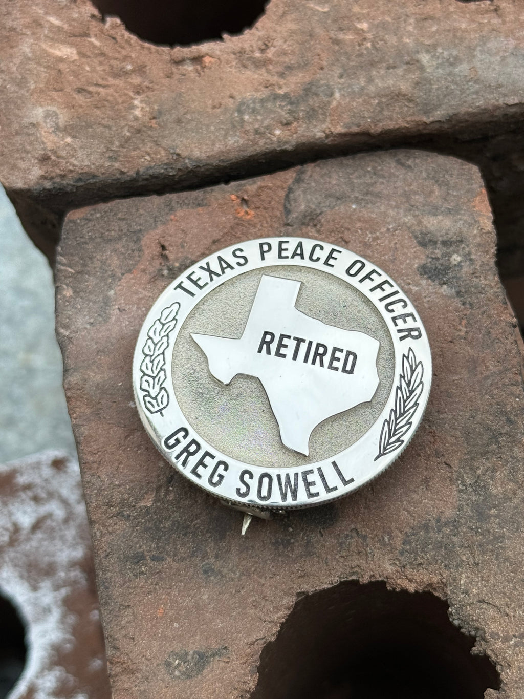 “The Texan” cinco peso badge