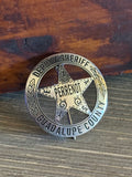 "Texas Pride Cinco Peso Badge"