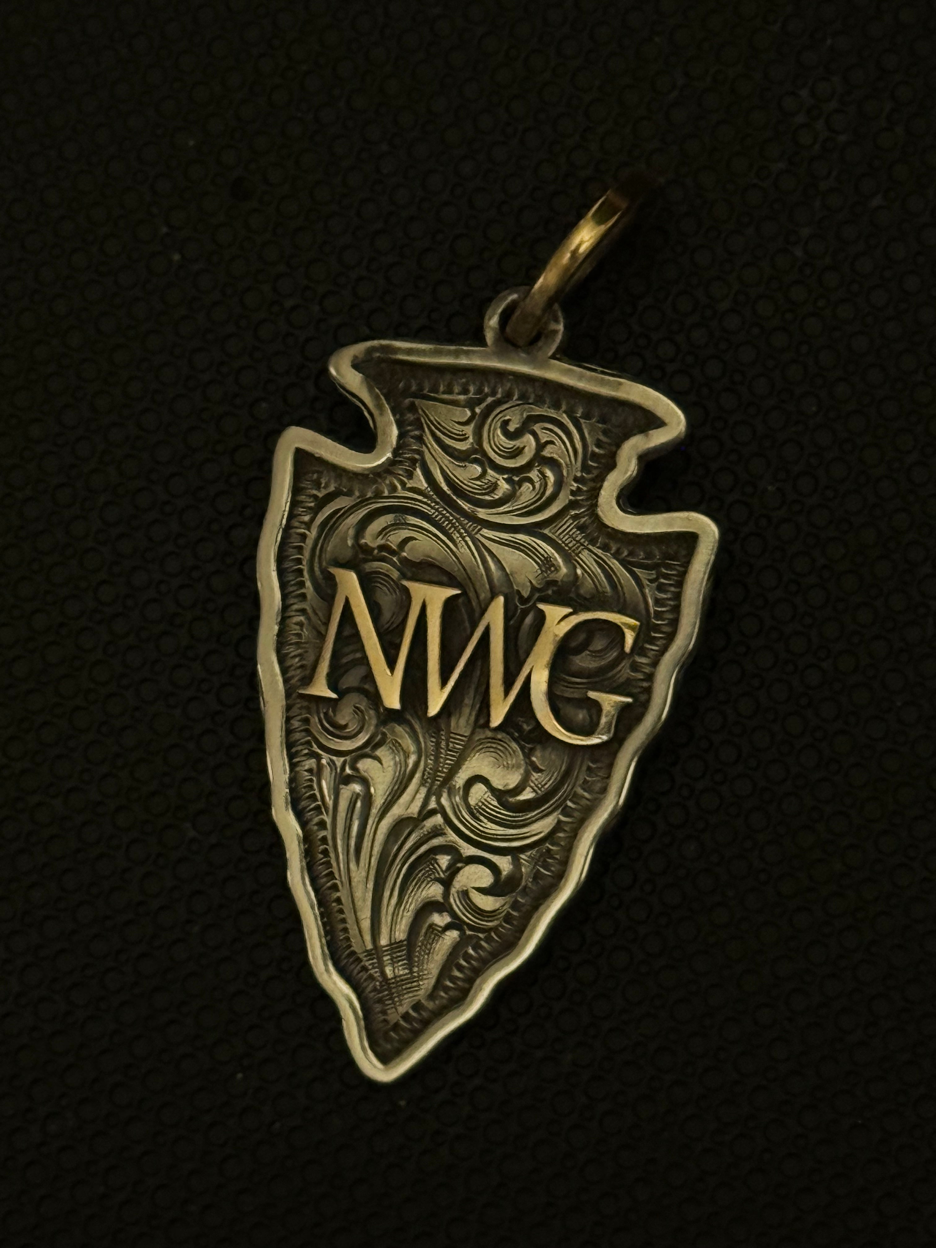Engraved Arrowhead Pendant